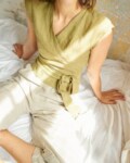 Women wearing linen wrap blouse top