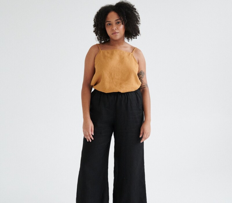 Women wearing black linen culottes