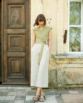 A model wearing natural grey summer linen pants