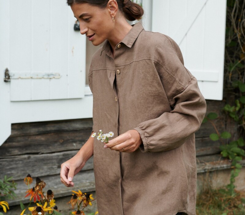 A model wearing a brown oversized linen shirt