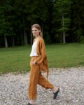 Linenfox model wearing dark yellow wide leg waffle linen pants