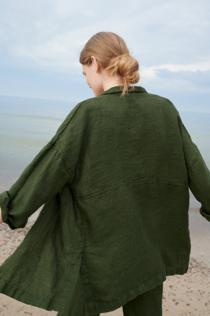 Back of a lightweight waffle linen button down shirt