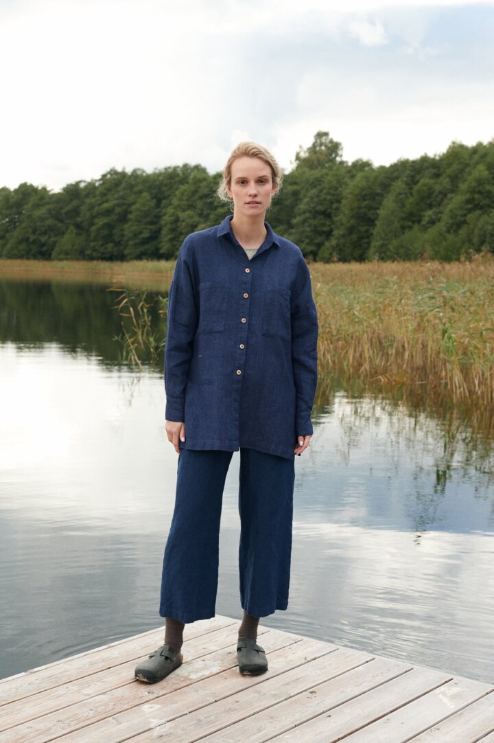 A model wearing wool blend Linenfox shirt in dark blue