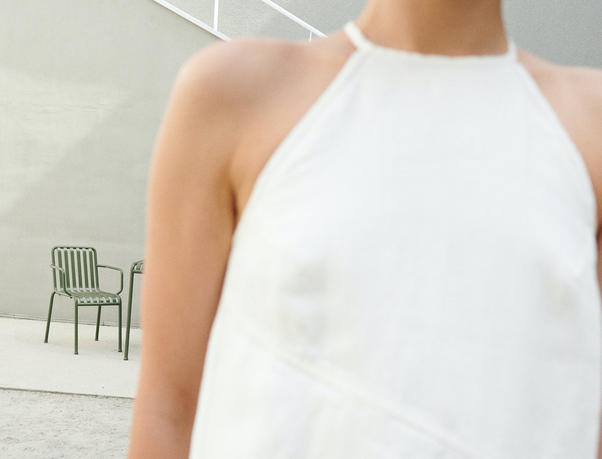 women in long white linen dress