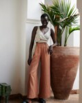 model is wearing wide leg linen pants