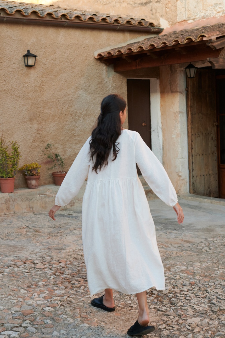model wearing Margo maxi white linen dress