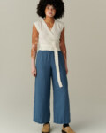 women is wearing wide-leg blue linen pants