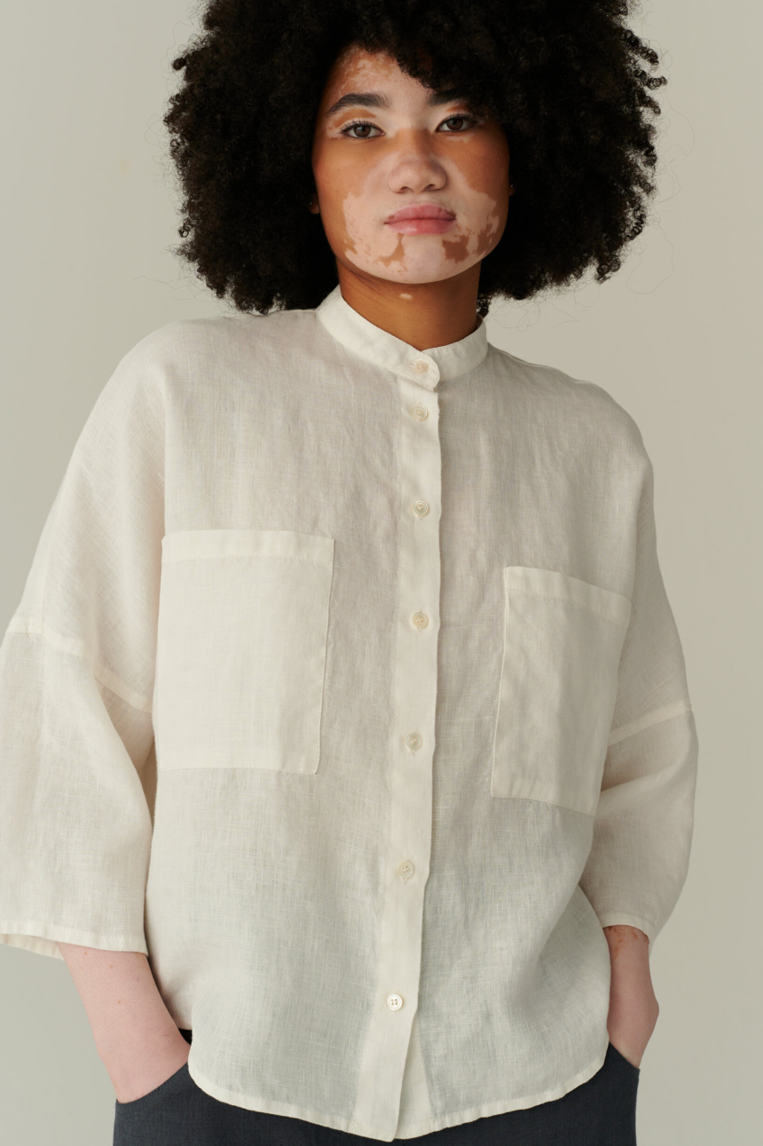 White linen shirt with boxy fit and band collar