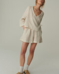 model is wearing linen shorts for women