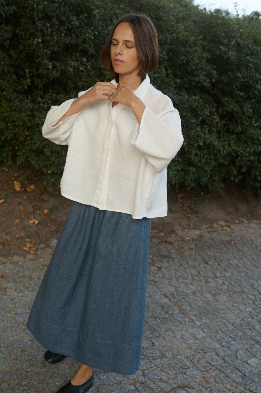 model is wearing wool maxi skirt