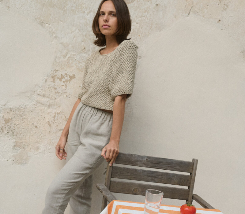 women is wearing tapered leg heavy linen pants