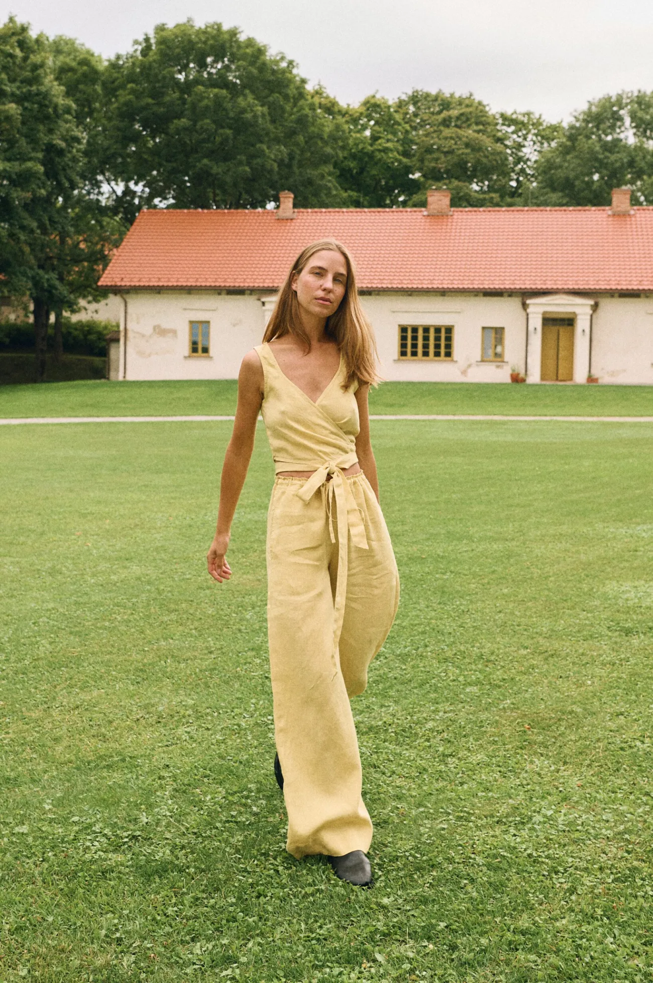 Breathable butter linen wrap top and matching wide-leg trousers with drawstring waist, natural summer outfit