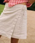White cotton-linen blend mini wrap skirt with adjustable waist ties
