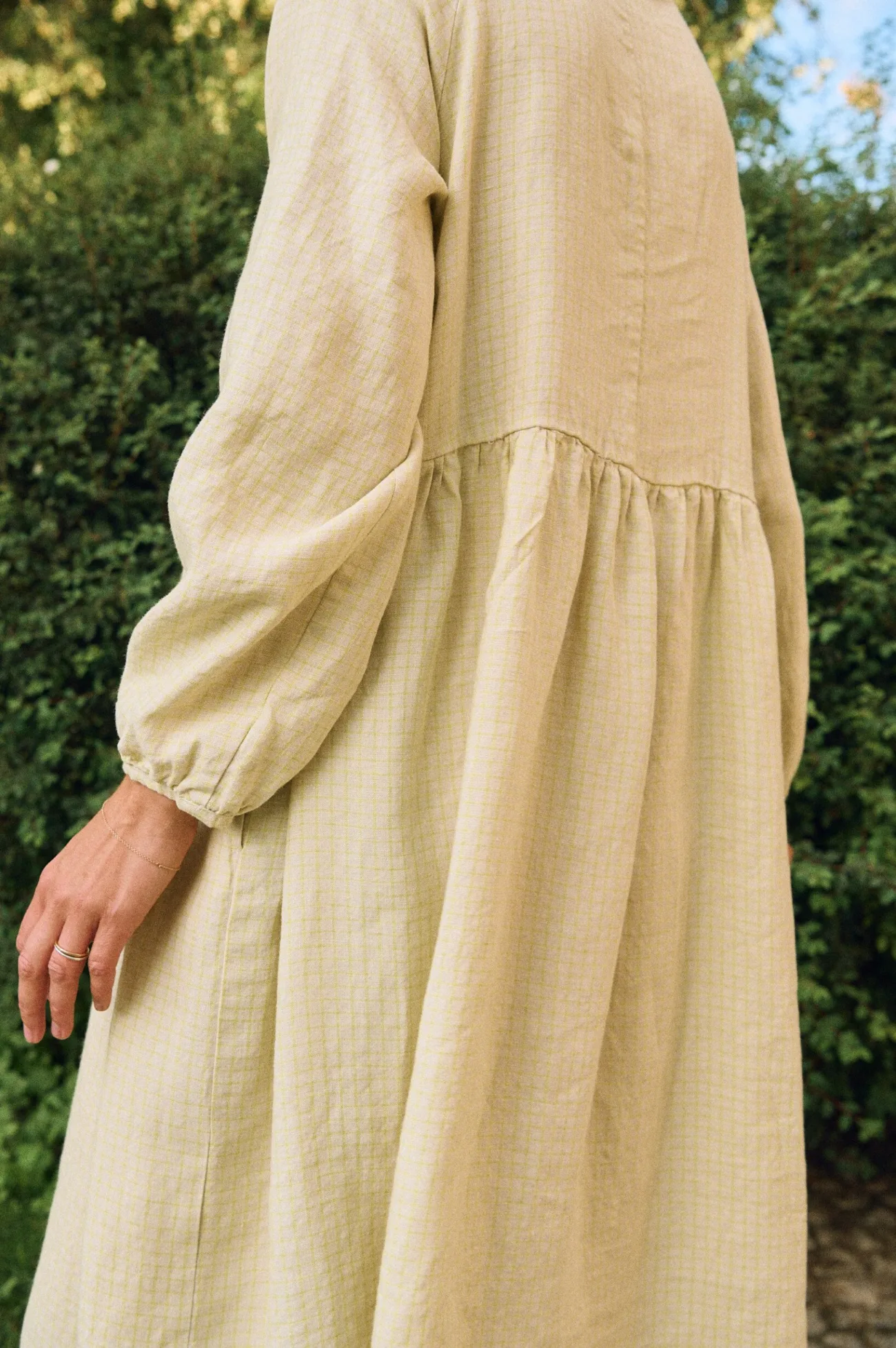 Close-up of apple checks linen fabric showing soft texture and subtle grid pattern