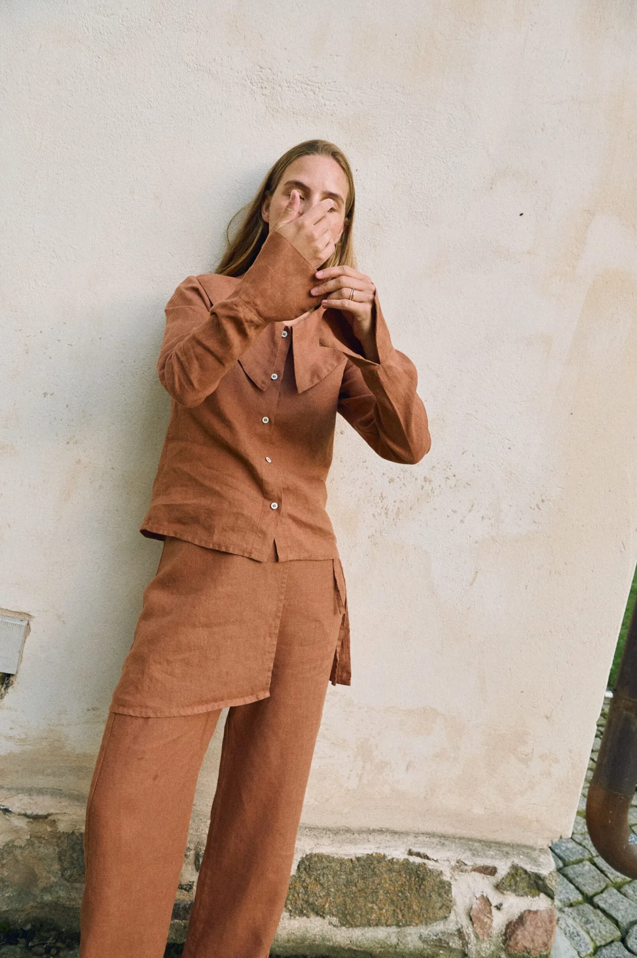 Mocha mousse linen two-piece set featuring button-front top and wrap-style overlay