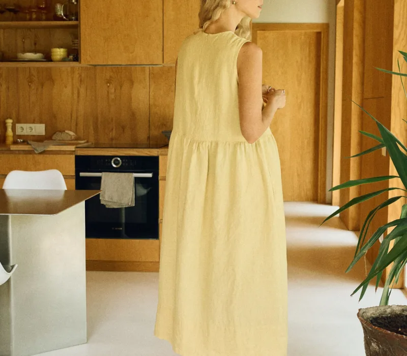 Butter yellow linen sleeveless dress back view with discreet zipper