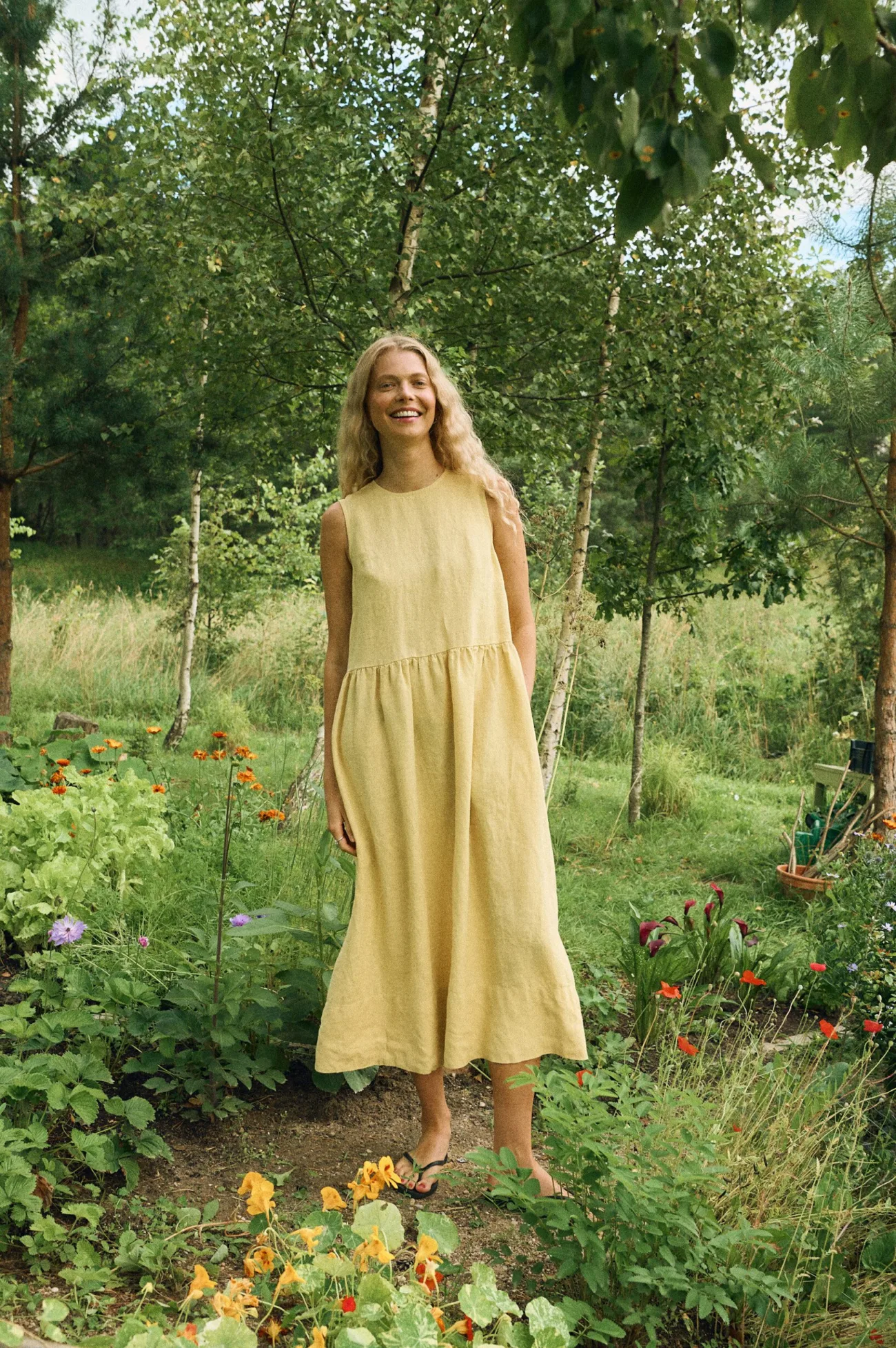 Butter yellow linen sleeveless midi dress with minimalist look