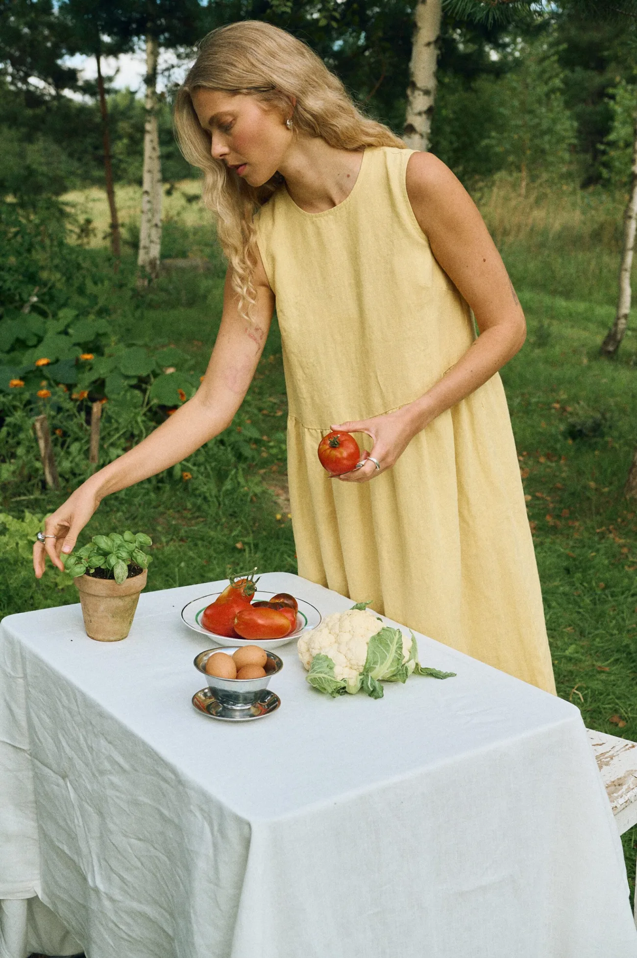 Butter linen midi dress with gathered waist and flowing skirt