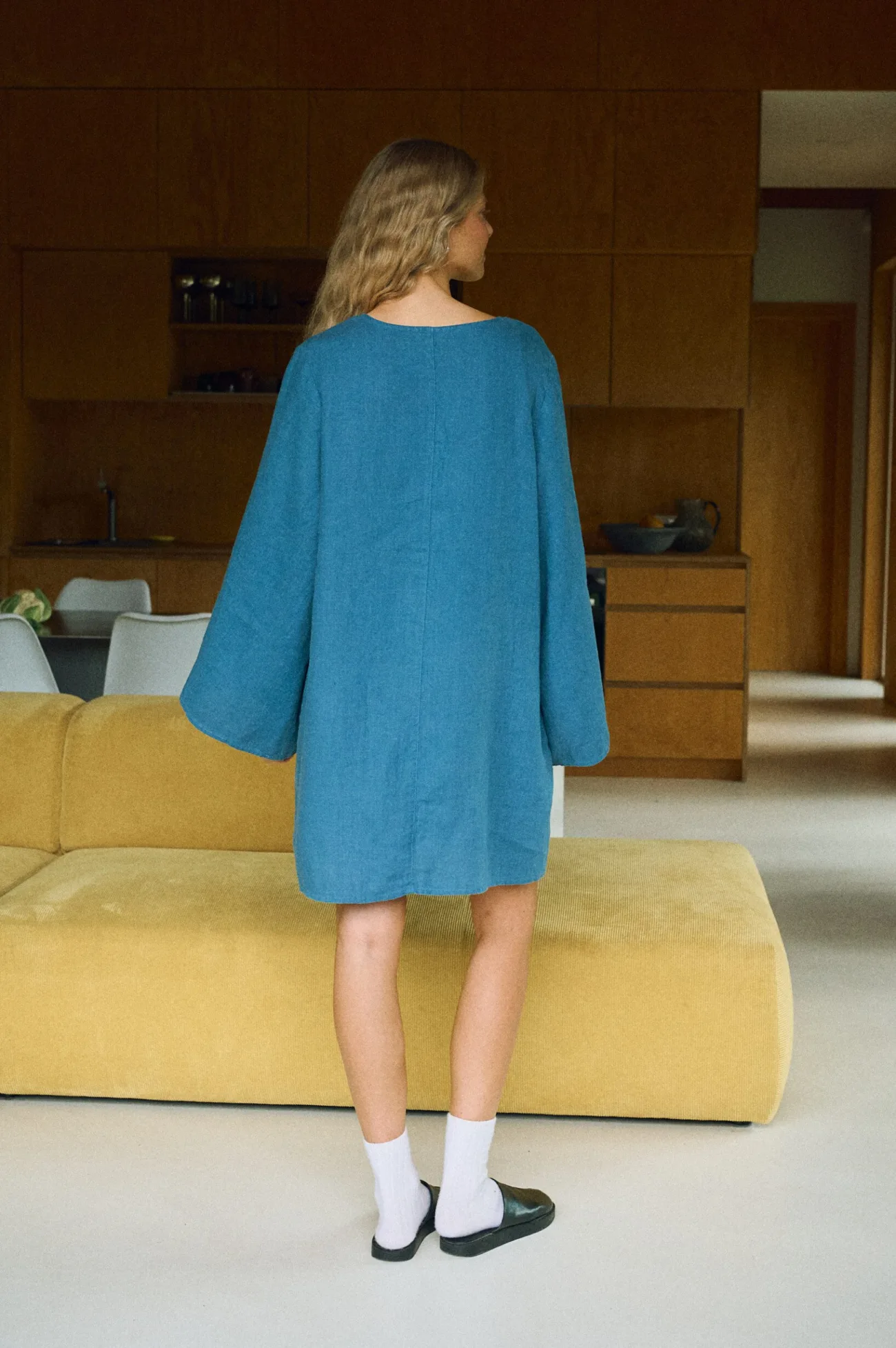 Back view of the Luise oversized mini dress in stellar blue linen