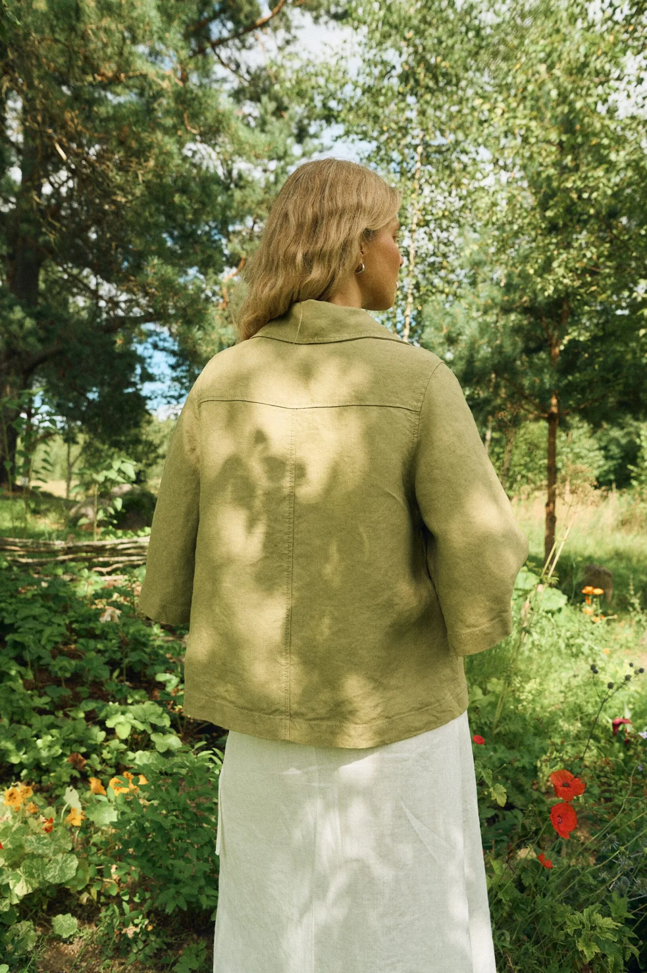 Back view of olive heavy linen jacket with wide half sleeves