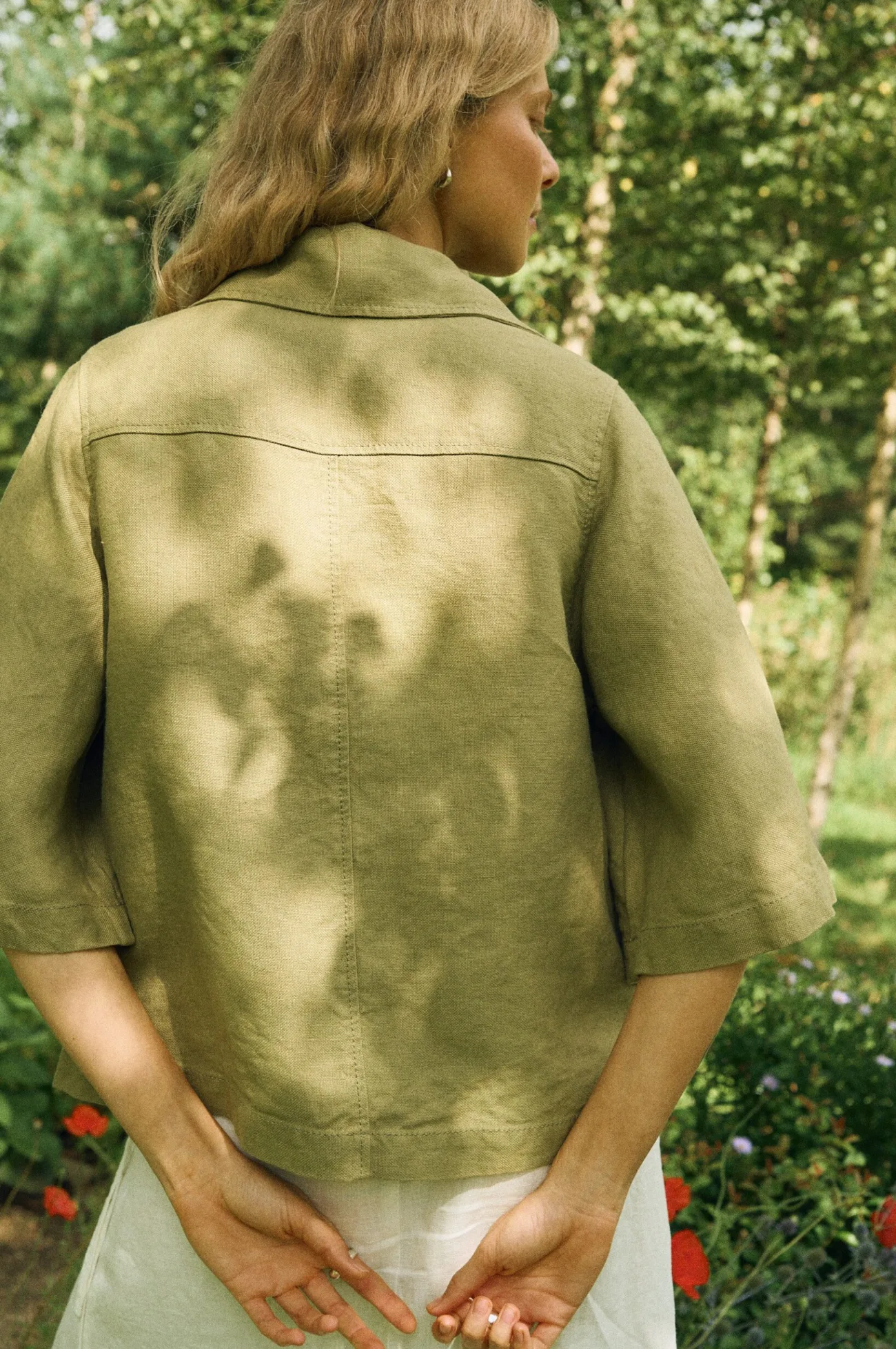 Olive heavy linen shirt back angle, relaxed boxy shape