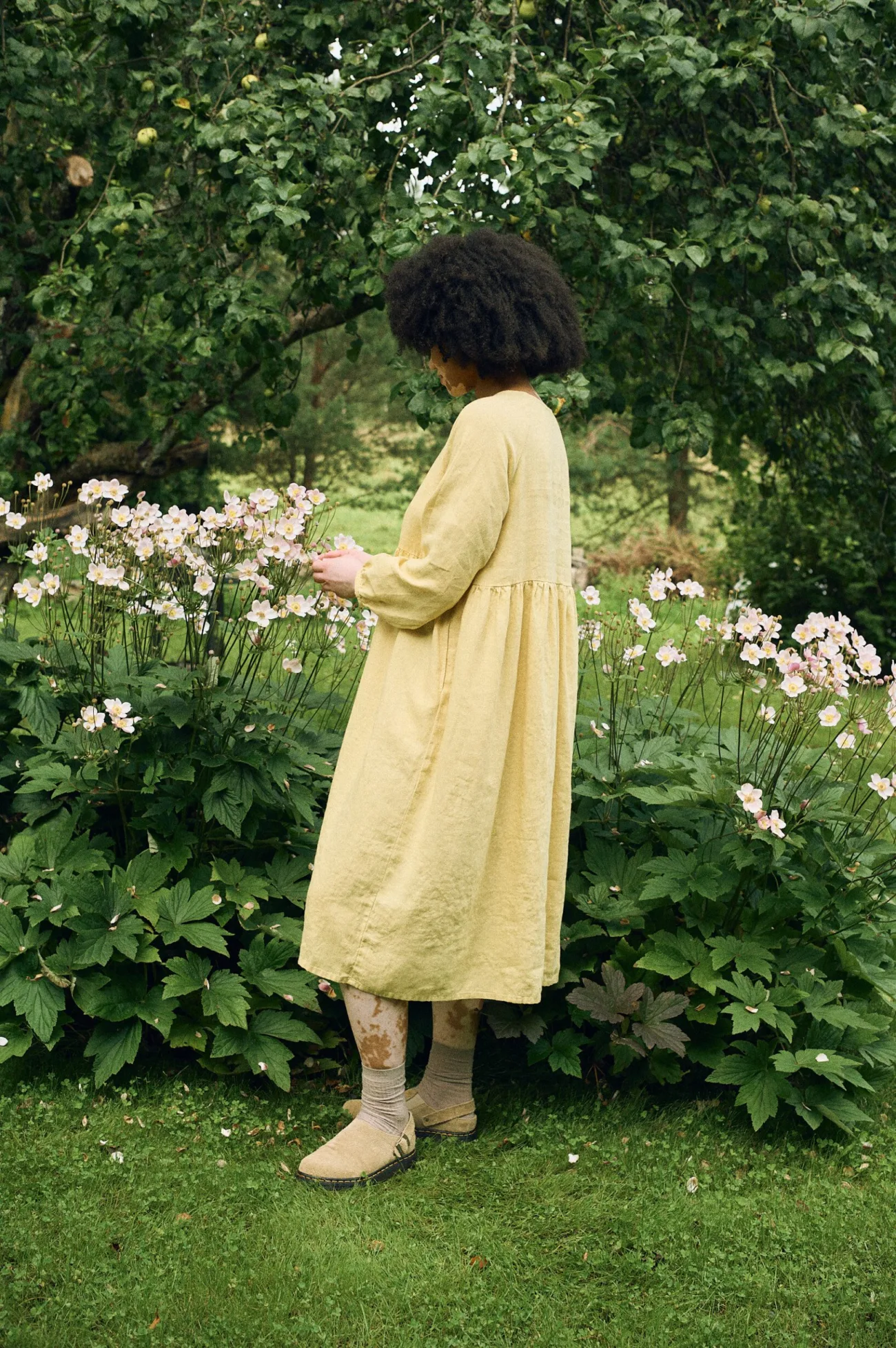 Side profile of the Margo dress, showcasing its flowing A-line silhouette