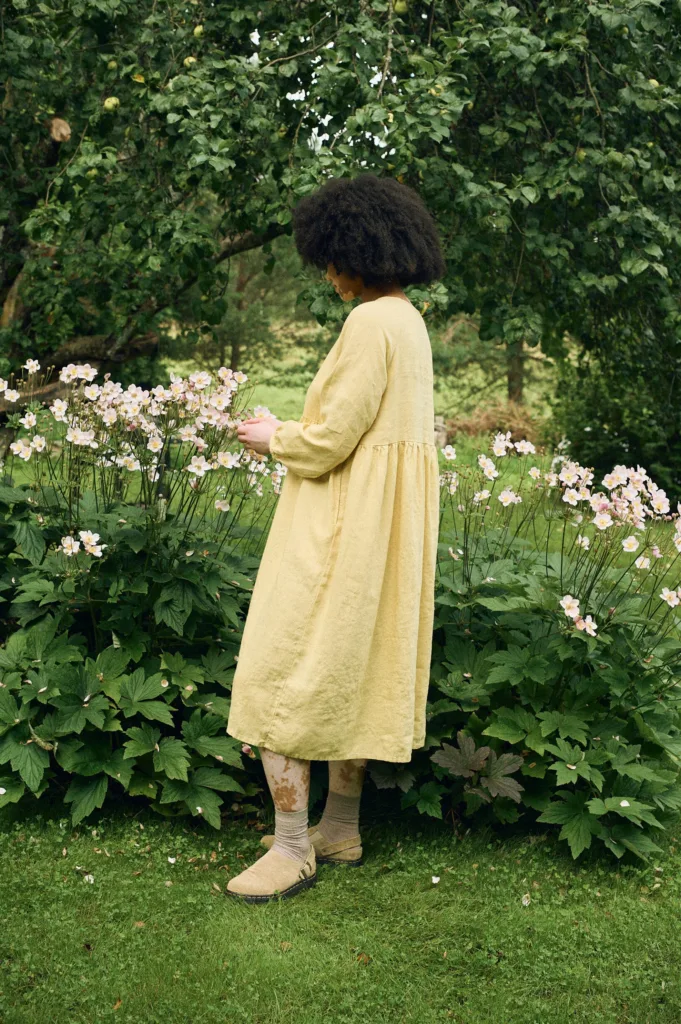 Side profile of the Margo dress, showcasing its flowing A-line silhouette