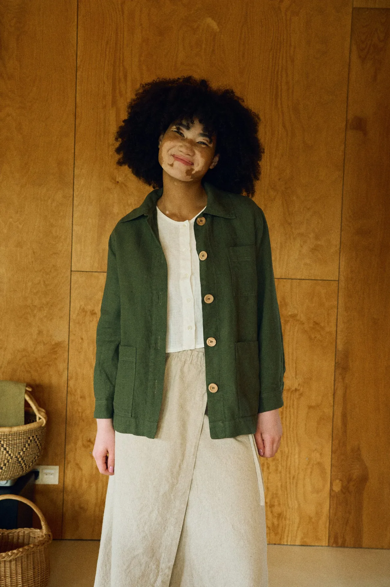 Outfit featuring the cropped top, maxi wrap skirt, and utility jacket in neutral tones