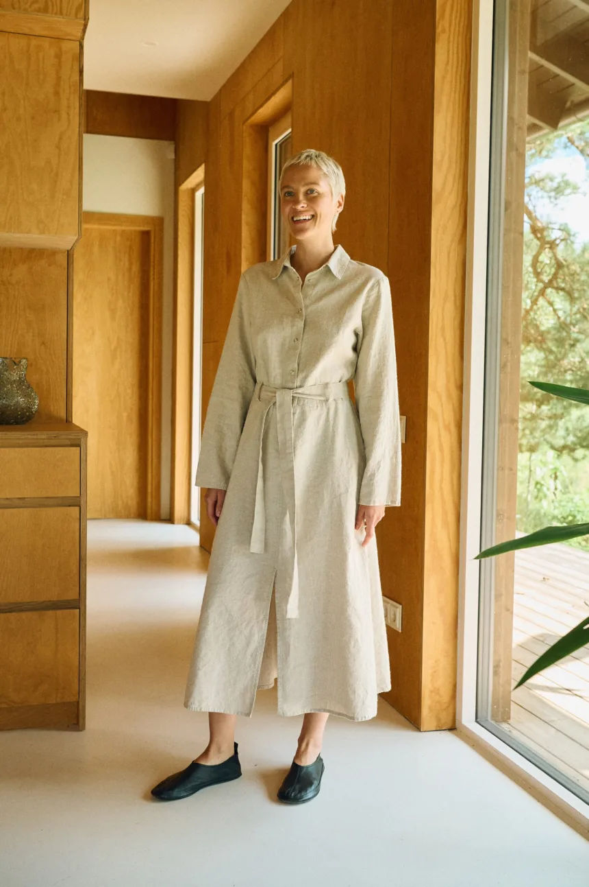 Natural-toned utility dress in a soft linen-cotton blend, with a snap-button front and matching belt