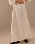 White linen maxi skirt with relaxed A-line shape and lightweight texture