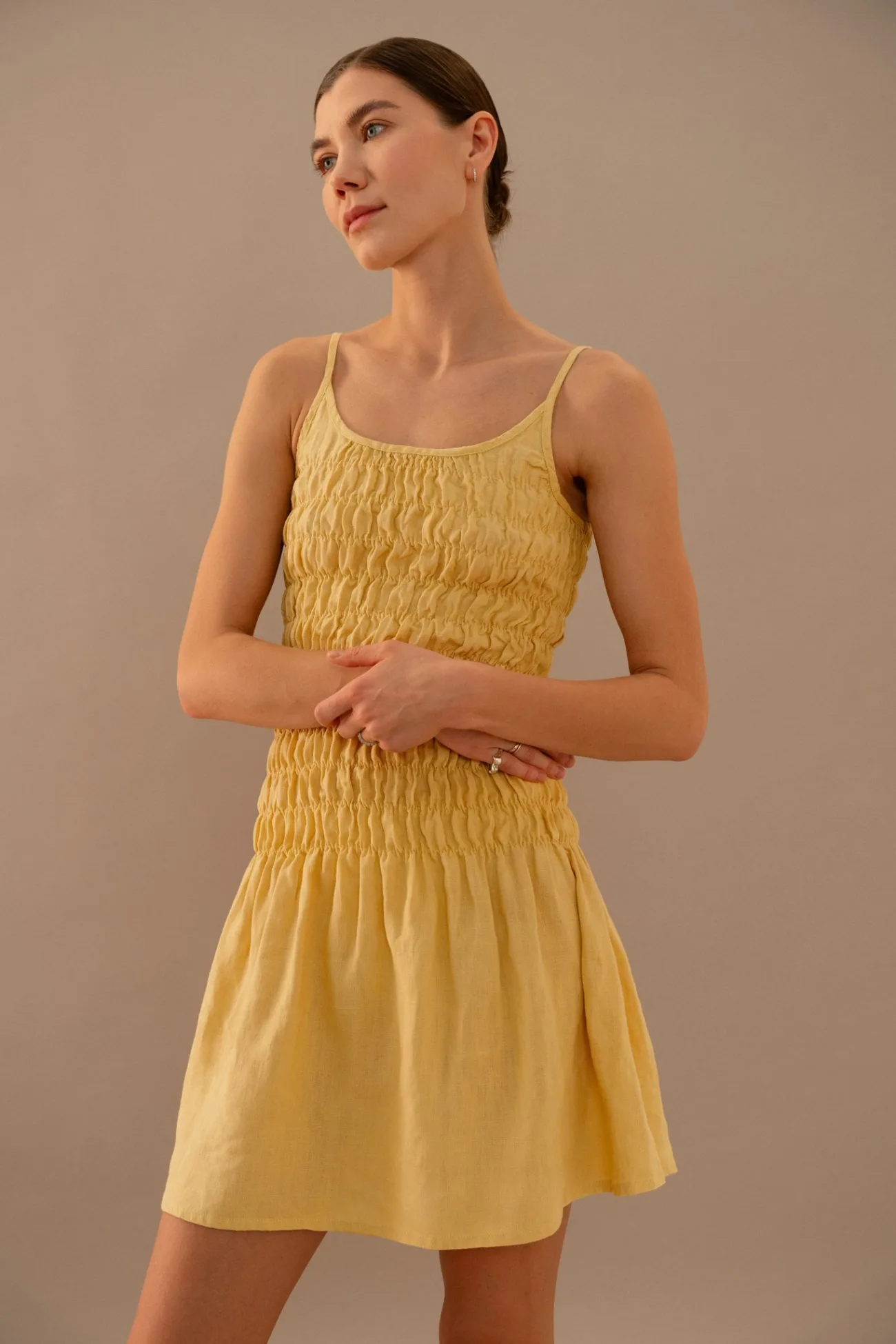 smocked mini linen dress in butter yellow color