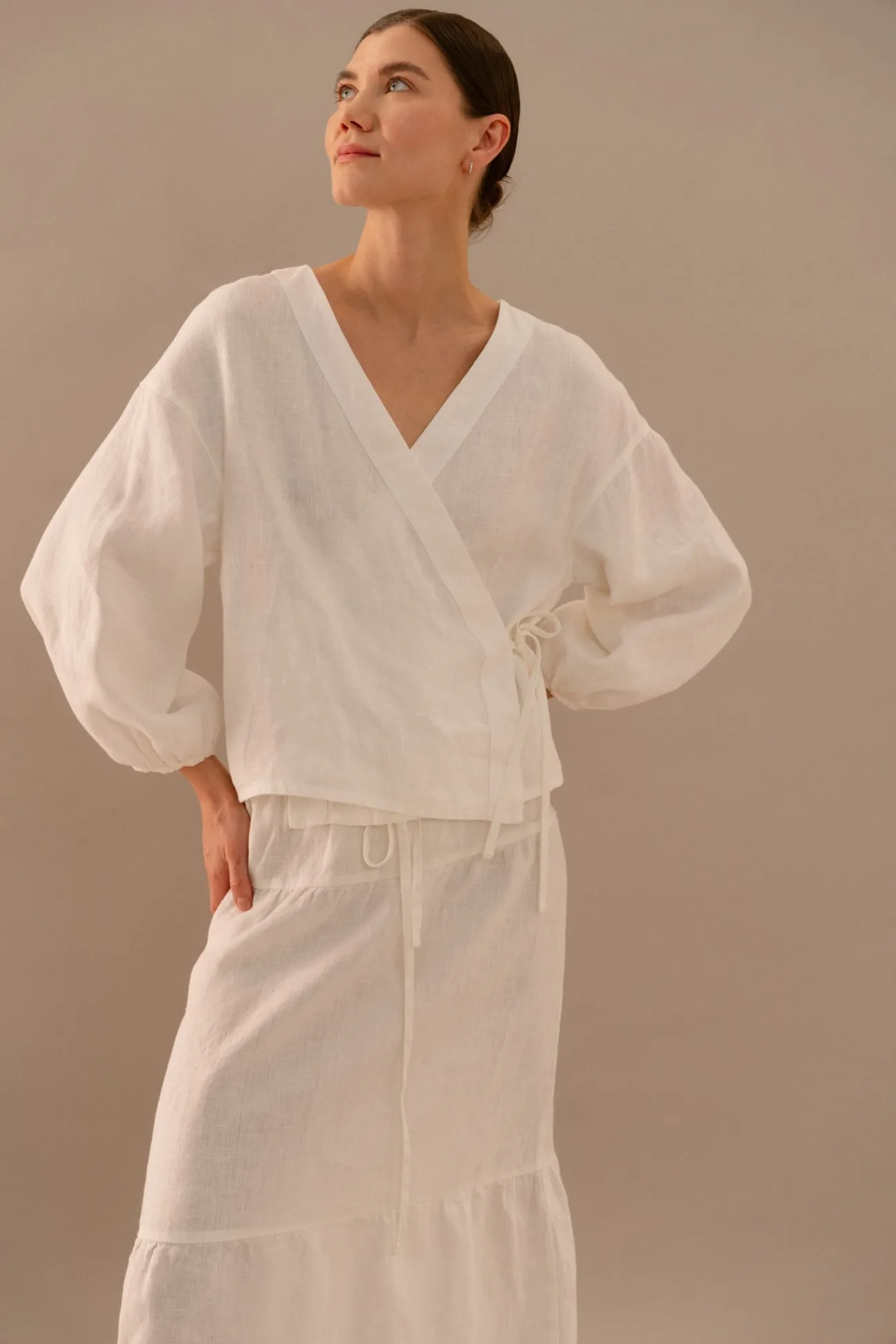 Milky white linen wrap top and tiered maxi skirt set with elasticated waist and adjustable drawstring