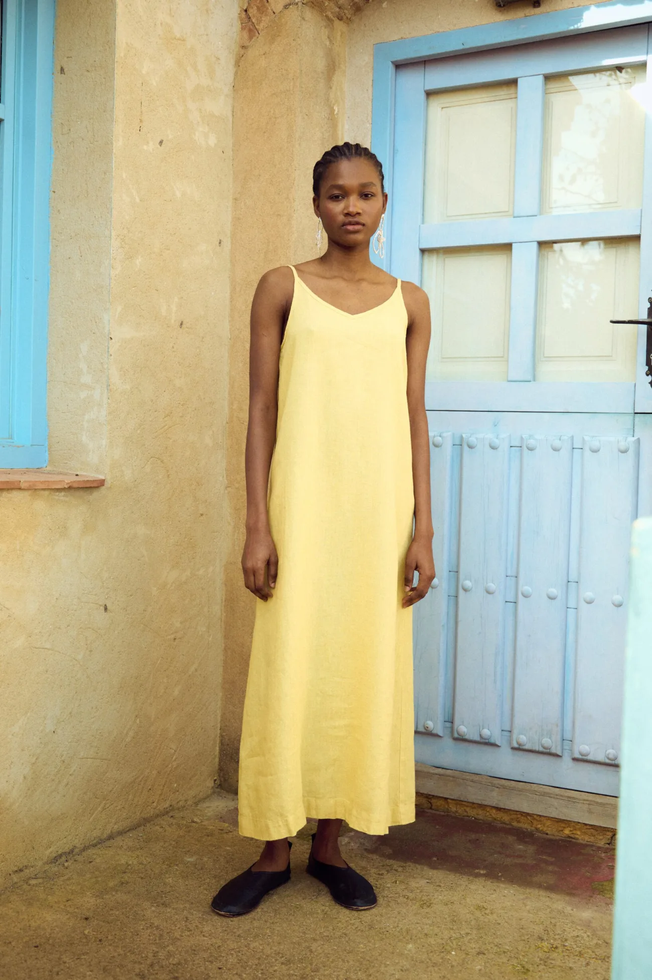butter linen slip dress with V neckline and thin straps, for relaxed minimalist silhouette