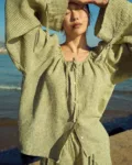 Green mini gingham linen top with gentle gathers at the neckline and wide sleeves, styled with linen shorts
