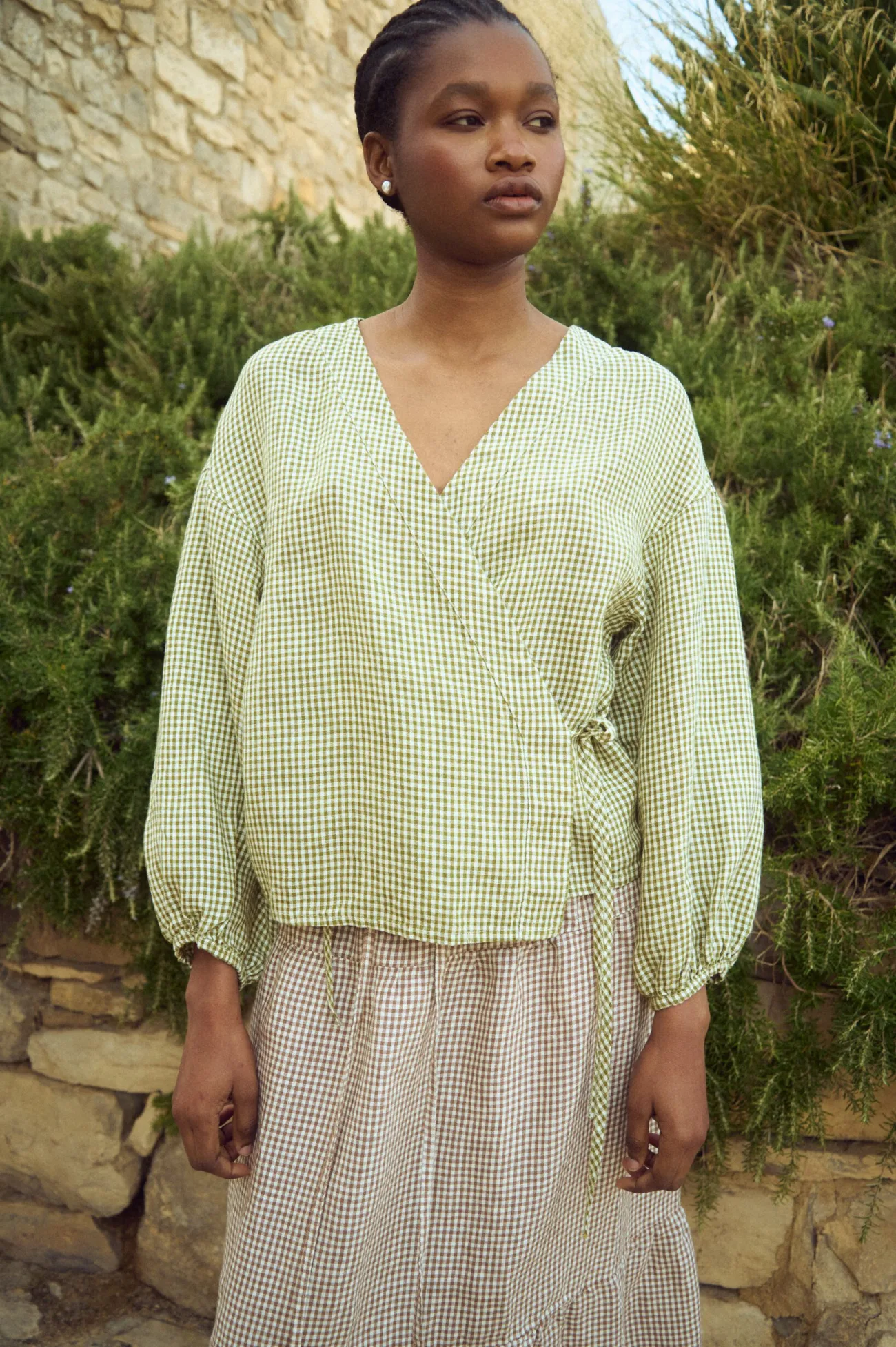 Moss green gingham linen top with crossover front and relaxed fit, featuring a side tie closure