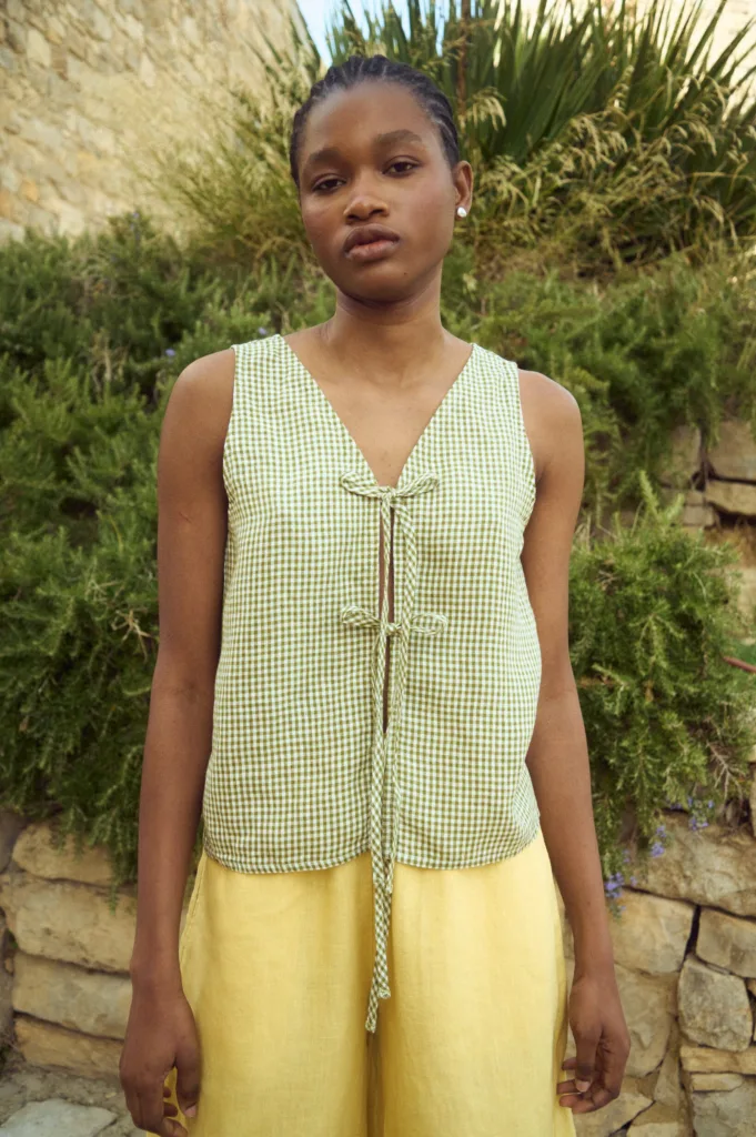 Moss green mini gingham linen top with front tie closure and sleeveless design