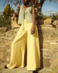 model is wearing butter linen culottes and gingham tie front top