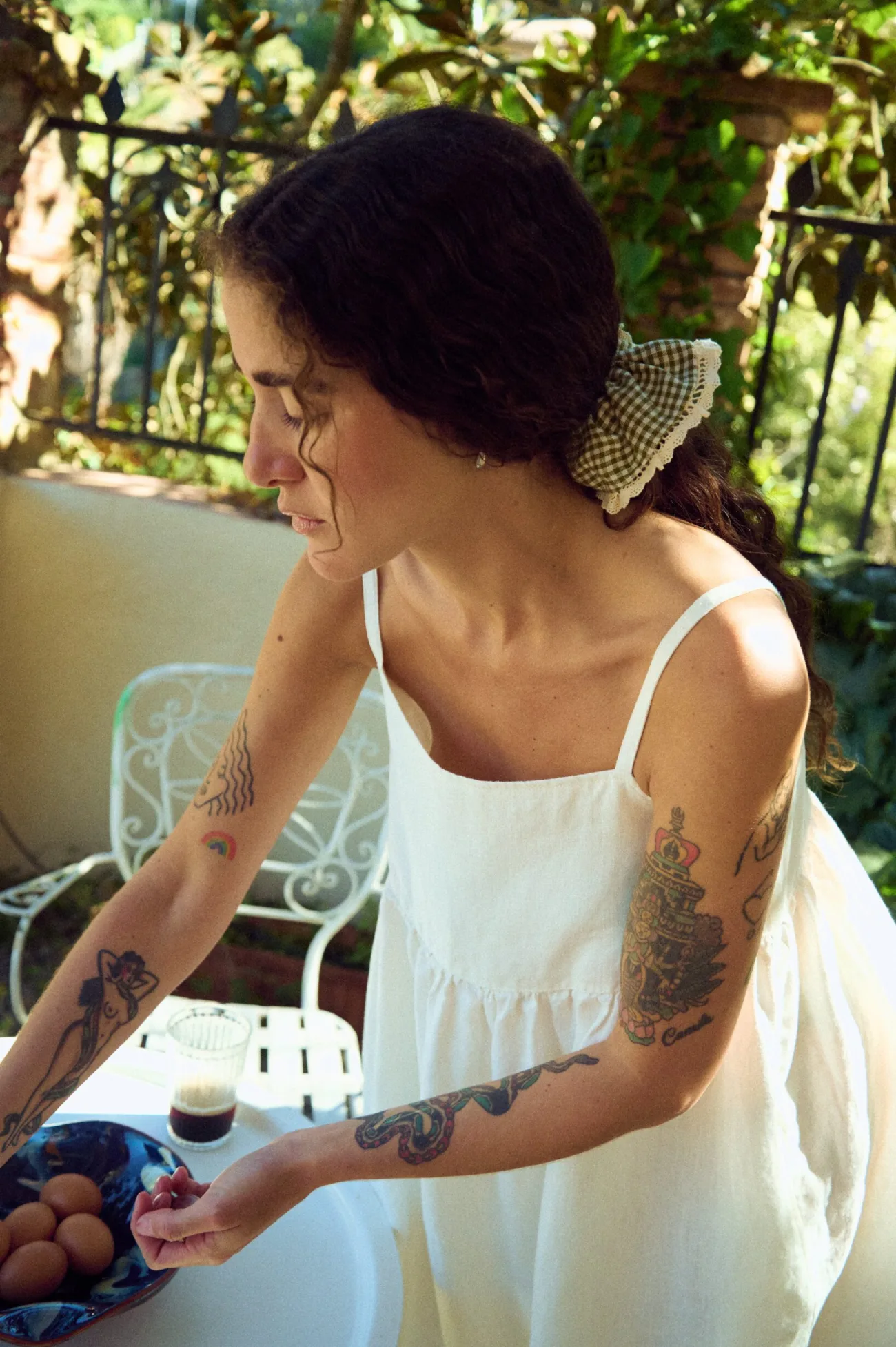 close up of white linen spaghetti strap midi dress