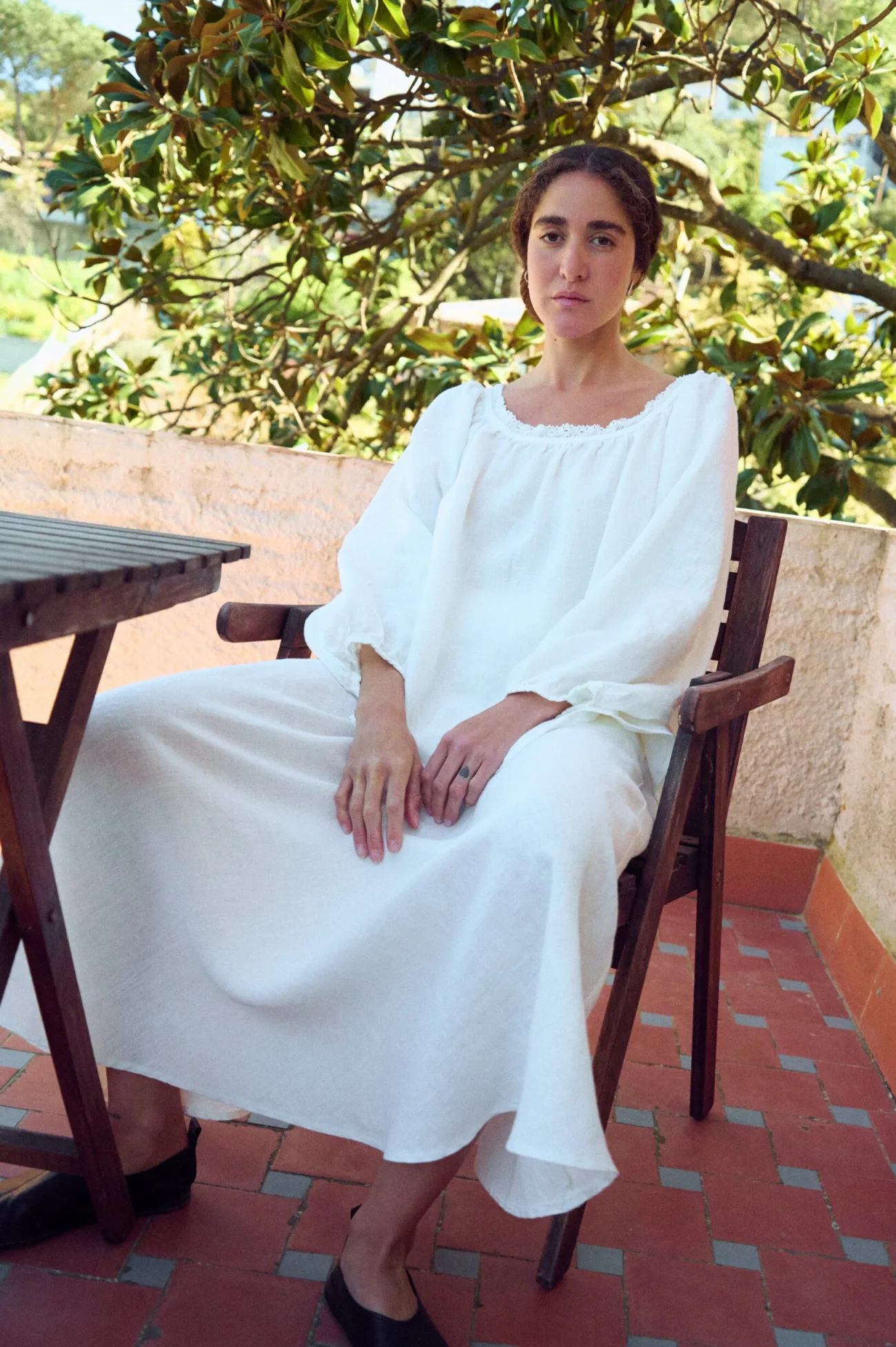 maxi white linen flowy skirt styled with oversized linen blouse with lace details