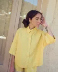 Oversized linen shirt with relaxed fit and button front
