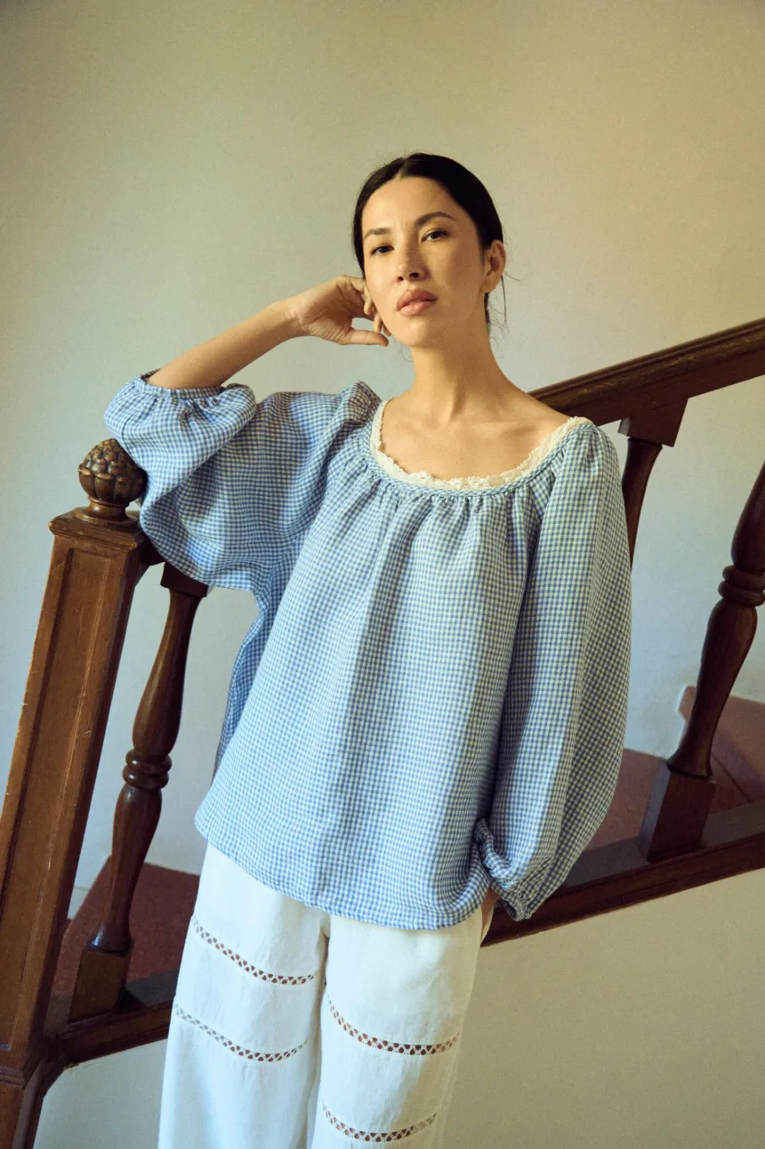 Blue gingham blouse with raglan sleeves and lace neckline