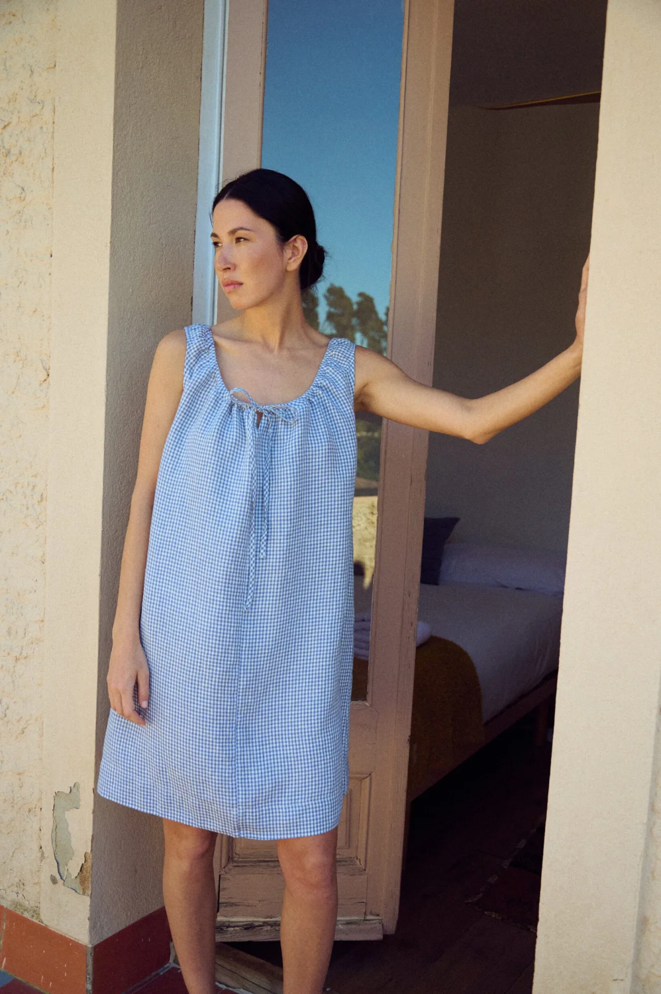 Mini gingham dress with drawstring neckline and loose fit