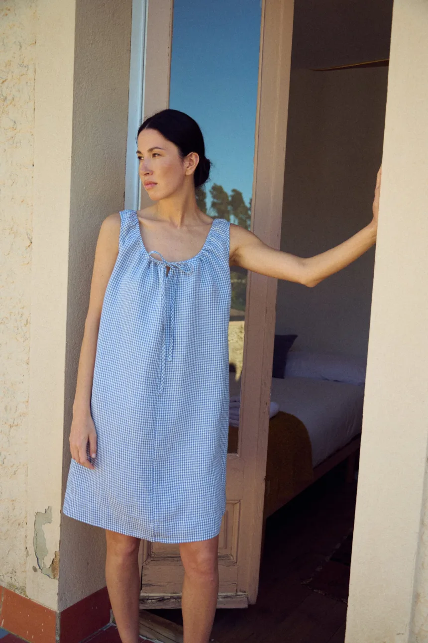 Mini gingham dress with drawstring neckline and loose fit