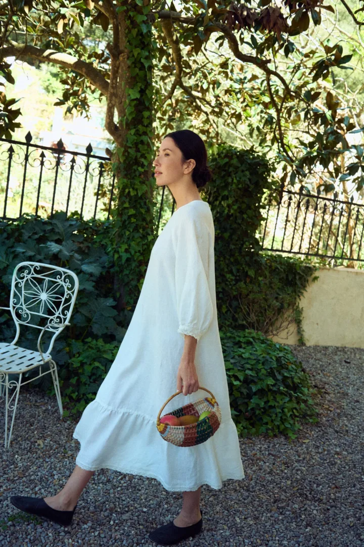 Linen summer dress with relaxed fit and linen lace trim at sleeves and hem