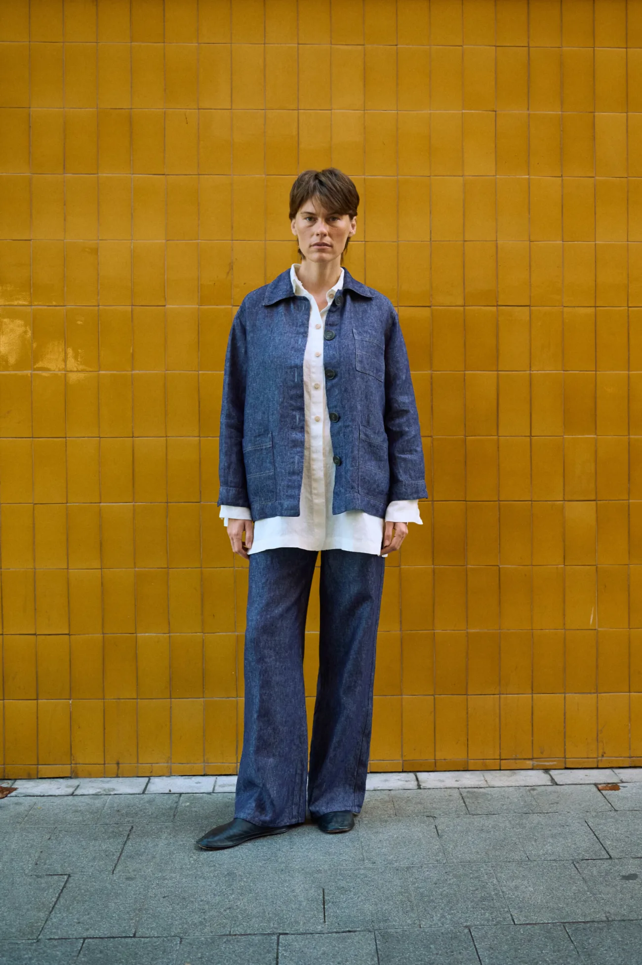 Blue denim linen jeans with wide legs, styled with a matching linen jacket and white linen shirt