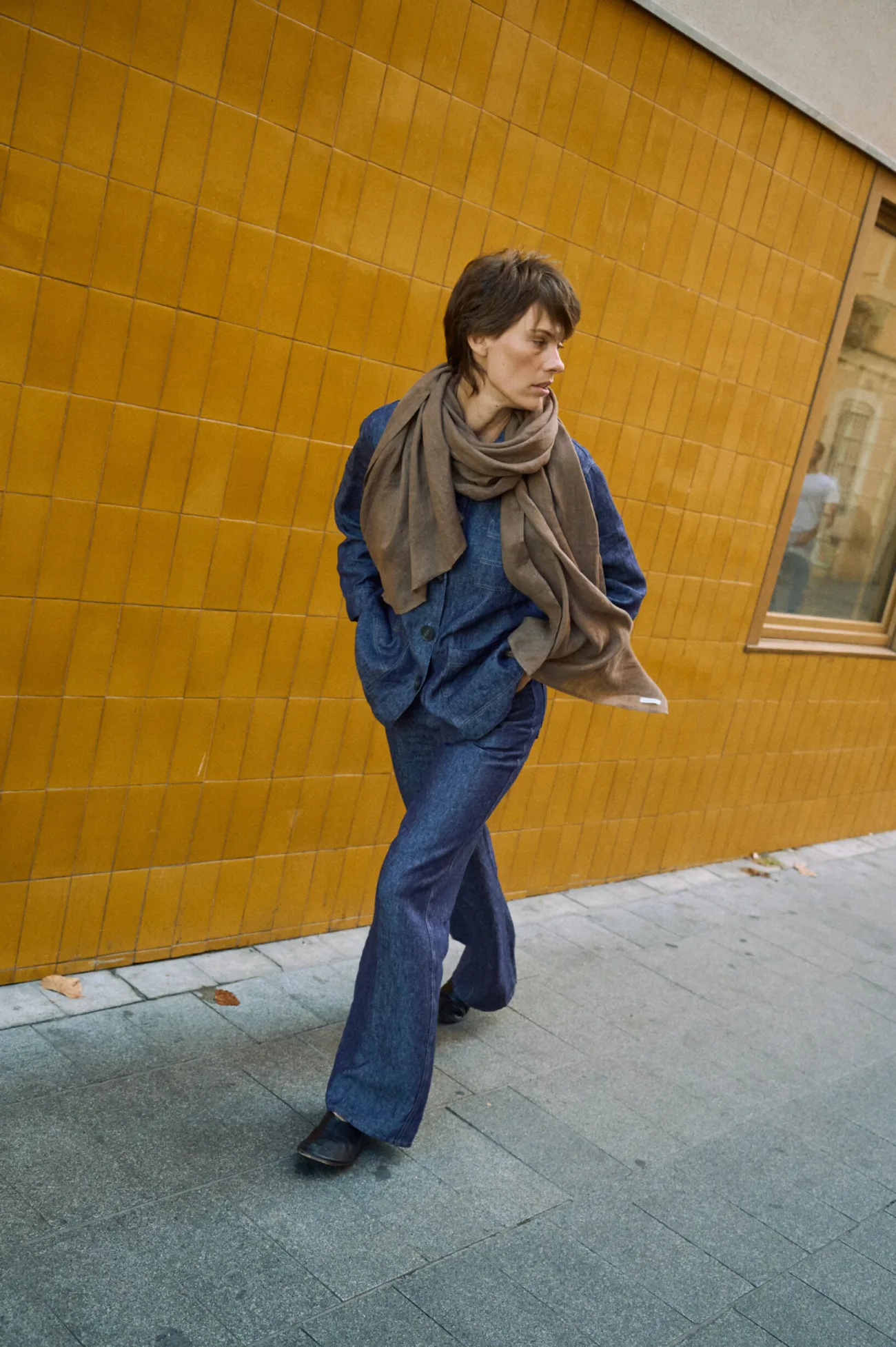 Blue denim linen jeans with wide legs, styled with a matching linen jacket and cacao brown linen scarf