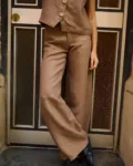 Brown heavy linen wide-leg trousers styled with a matching button-front linen vest