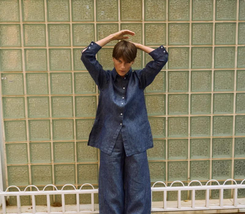 Blue denim linen pants with wide legs, styled with a matching button-down linen shirt